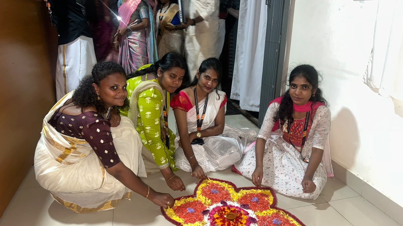 OCTS Women Creating Floral Kolam